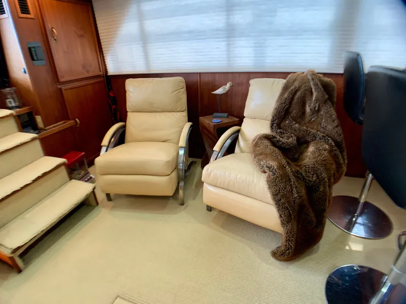 Slide: The Image of Interior of a 1988 Harbor Master 520 Coastal yacht with leather chairs. - 9
