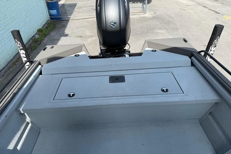 Slide: The Image of 2026 SeaArk Protege 200 boat with Suzuki outboard motor, viewed from the rear deck. - 12