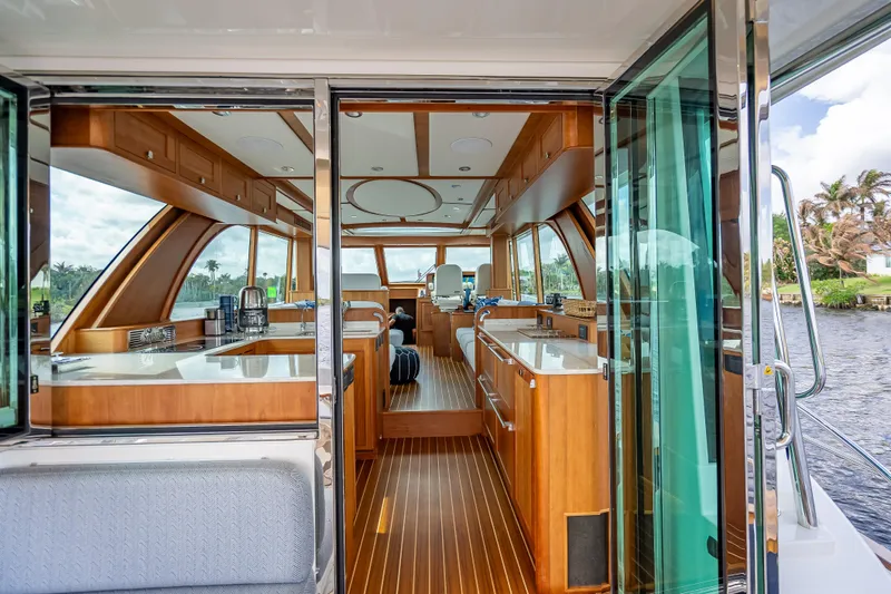 Slide: The Image of Luxurious interior of 2025 Sabre 58 Salon Express yacht with elegant wood finishes. - 14
