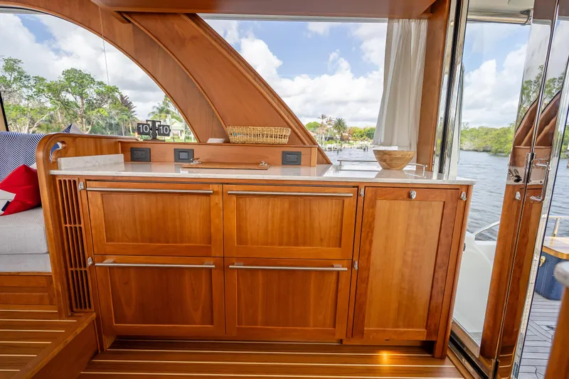 Slide: The Image of Luxurious interior of 2025 Sabre 58 Salon Express yacht with elegant wooden cabinetry. - 22