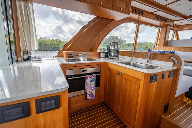 Slide: The Image of Luxurious kitchen interior of 2025 Sabre 58 Salon Express yacht with modern amenities. - 23