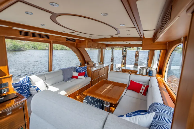Slide: The Image of Luxurious interior of 2025 Sabre 58 Salon Express yacht with elegant wood finishes. - 26