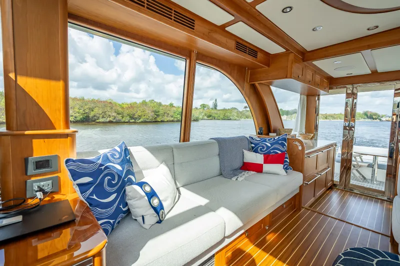 Slide: The Image of Luxurious interior of 2025 Sabre 58 Salon Express yacht with scenic water view. - 28