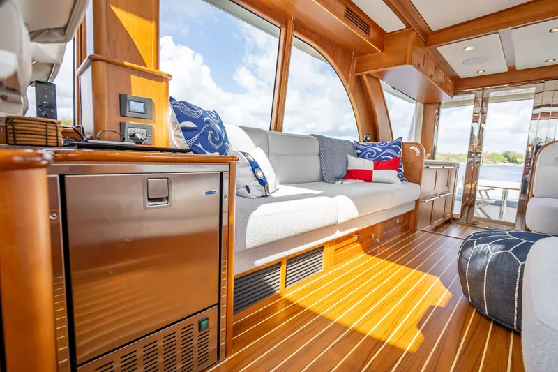 Slide: The Image of Luxurious interior of 2025 Sabre 58 Salon Express yacht with elegant wood finish. - 29