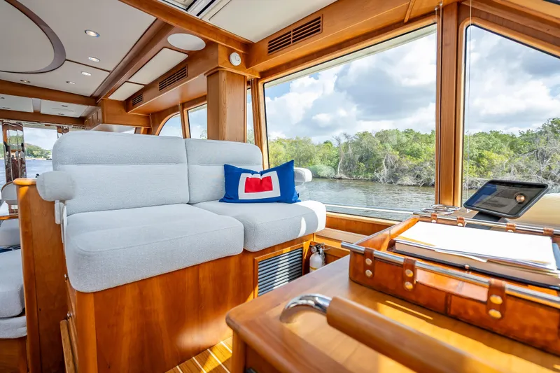 Slide: The Image of Luxurious interior of 2025 Sabre 58 Salon Express yacht with scenic water view. - 32