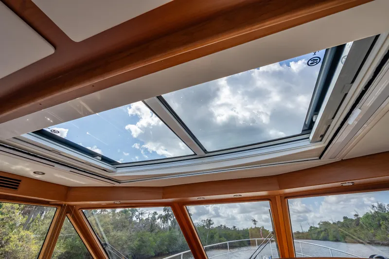 Slide: The Image of 2025 Sabre 58 Salon Express skylight view with scenic outdoor backdrop. - 36