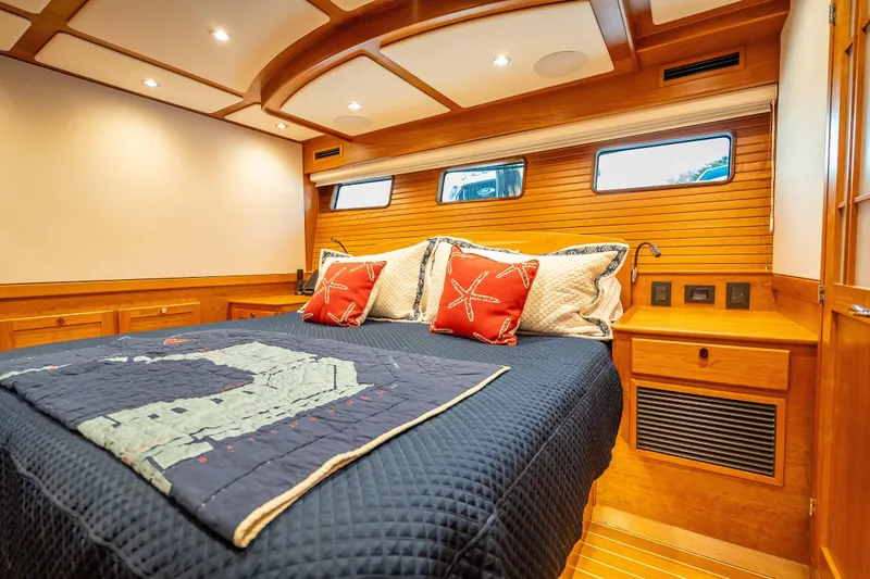 Slide: The Image of Luxurious cabin interior of 2025 Sabre 58 Salon Express yacht with cozy bedding. - 40