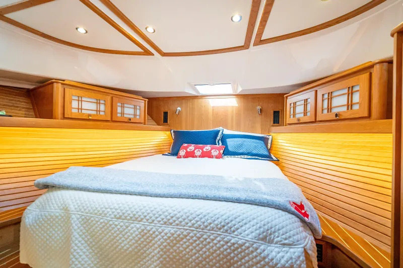 Slide: The Image of Luxurious cabin interior of 2025 Sabre 58 Salon Express yacht with cozy bedding. - 49