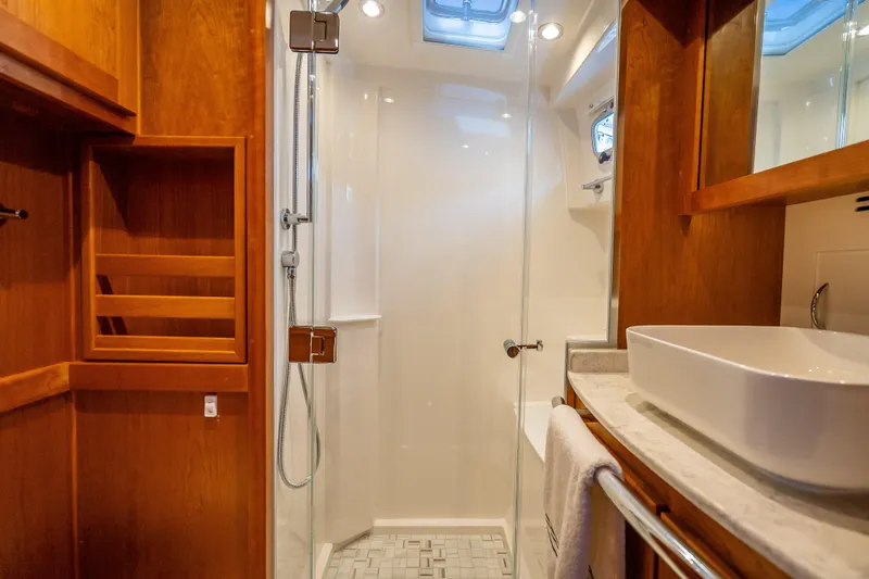 Slide: The Image of Luxurious bathroom interior of 2025 Sabre 58 Salon Express yacht with modern fixtures. - 51