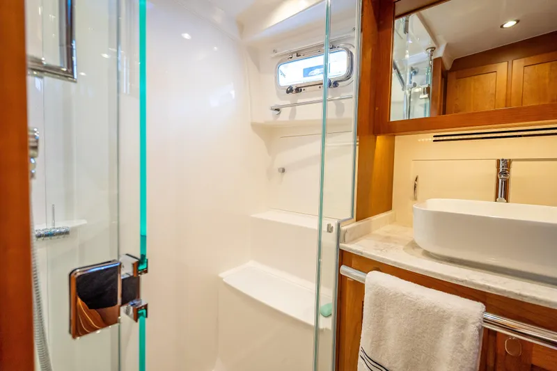 Slide: The Image of Luxurious bathroom interior of 2025 Sabre 58 Salon Express yacht with modern fixtures. - 53