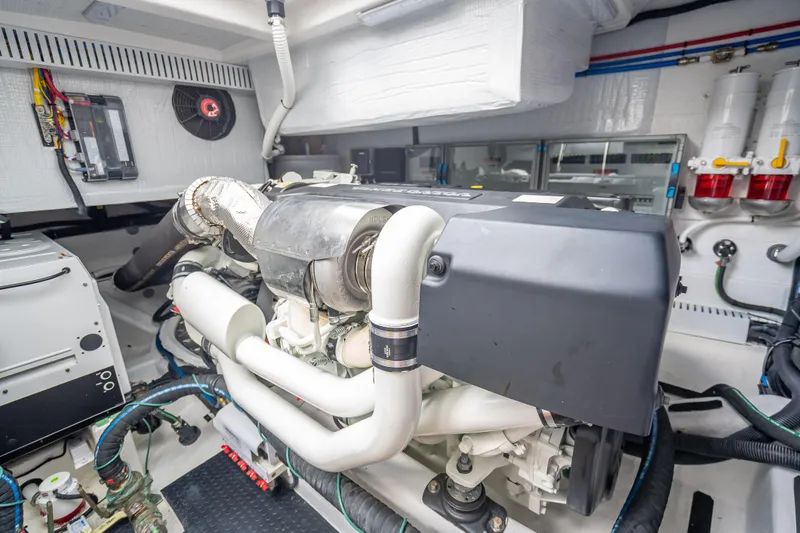 Slide: The Image of Engine room of 2025 Sabre 58 Salon Express yacht, showcasing advanced machinery and components. - 65