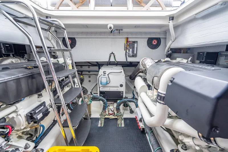 Slide: The Image of Engine room of 2025 Sabre 58 Salon Express yacht, showcasing advanced machinery and equipment. - 66