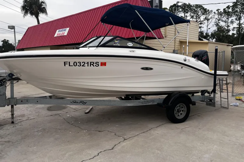Slide: The Image of 2018 Sea Ray SPX 190 Outboard boat on trailer at marine sales lot. - 13