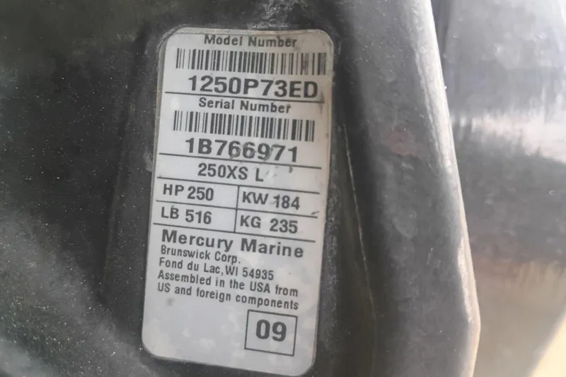 Slide: The Image of Label on Mercury Marine engine, model 250XS, with specifications and serial number. - 11