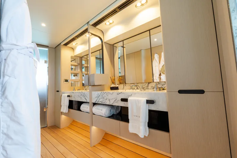 Slide: The Image of Luxurious bathroom interior of 2023 Azimut Grande 32M yacht with elegant marble accents. - 10