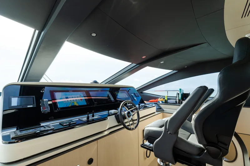 Slide: The Image of Luxurious helm of 2023 Azimut Grande 32M yacht with advanced navigation systems. - 19
