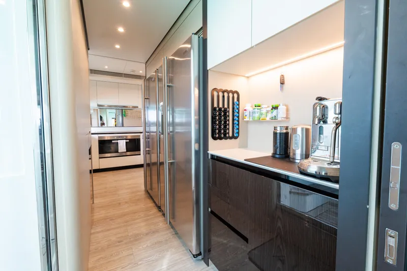 Slide: The Image of Modern kitchen in 2023 Azimut Grande 32M yacht with sleek appliances and stylish design. - 22