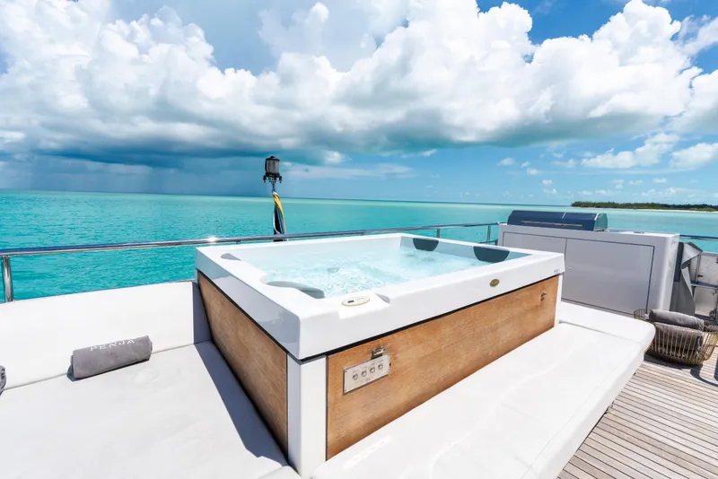 Slide: The Image of Luxurious jacuzzi on Azimut Grande 32M yacht, 2023 model, with stunning ocean view. - 29