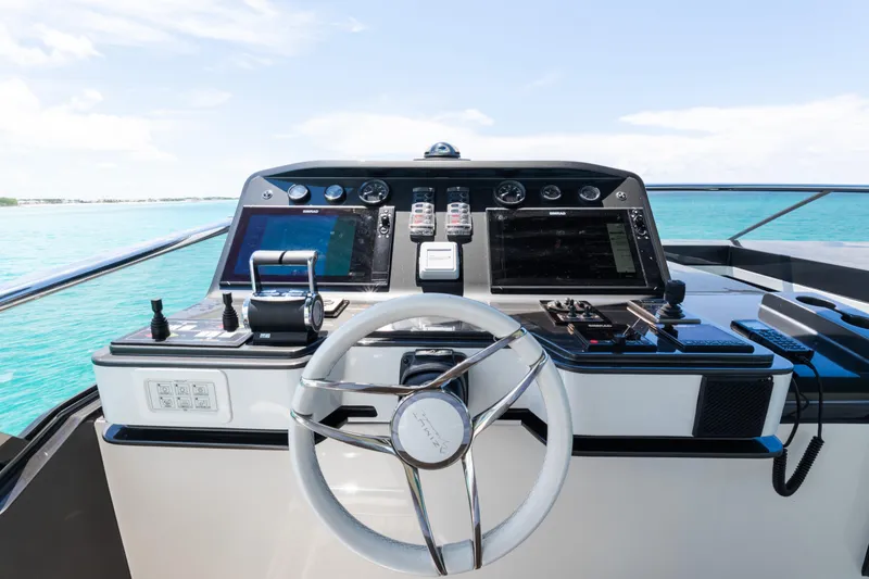 Slide: The Image of Helm of 2023 Azimut Grande 32M yacht with modern navigation equipment. - 33