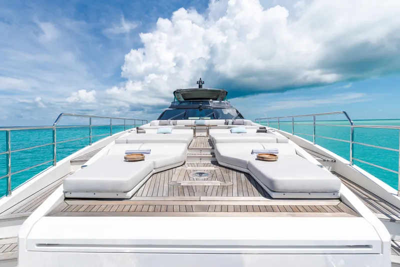 Slide: The Image of Luxurious 2023 Azimut Grande 32M yacht deck with sun loungers and ocean view. - 36