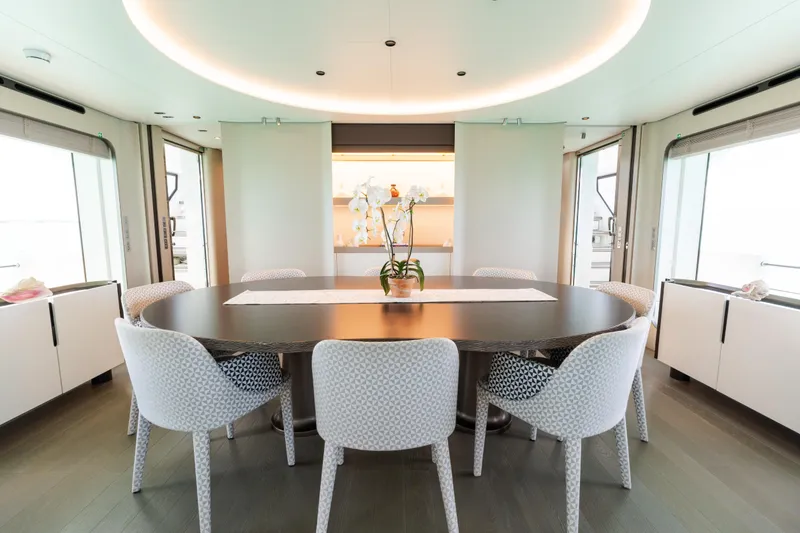 Slide: The Image of Luxurious dining area on 2023 Azimut Grande 32M yacht with elegant decor. - 7