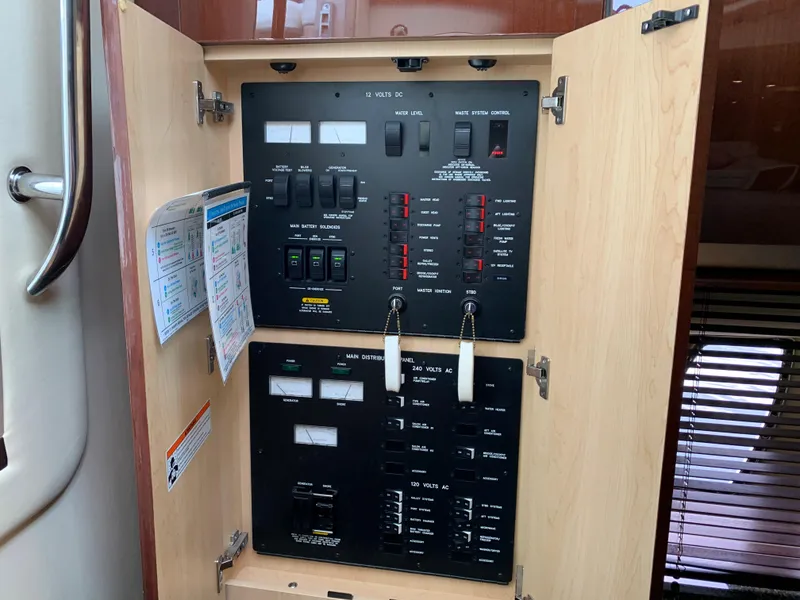 Slide: The Image of Electrical control panel of 2007 Sea Ray 52 Sundancer. - 16