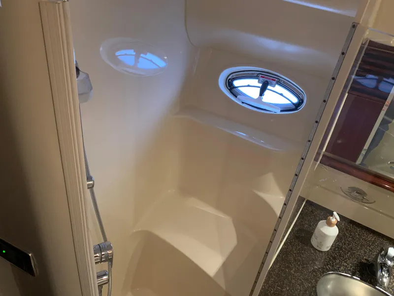 Slide: The Image of Interior of 2007 Sea Ray 52 Sundancer with porthole and sink. - 27