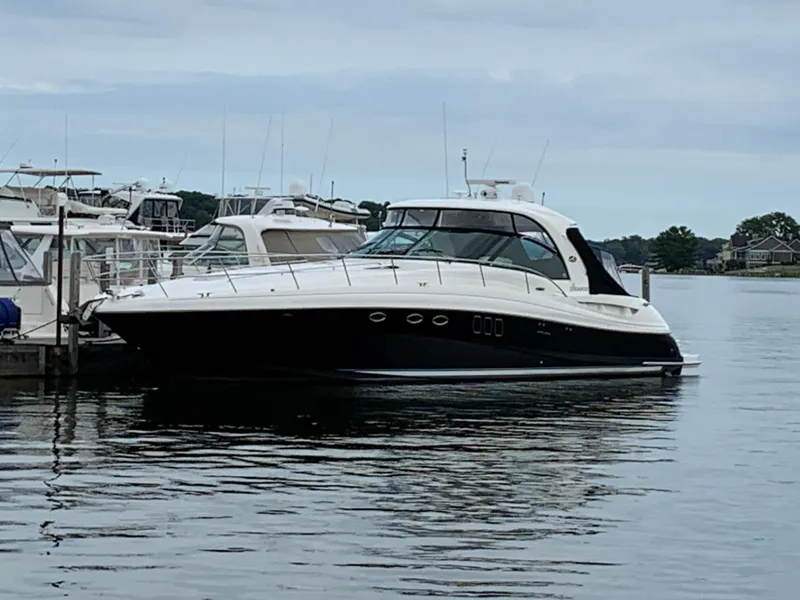 Slide: The Image of 2007 Sea Ray 52 Sundancer yacht docked in harbor. - 3