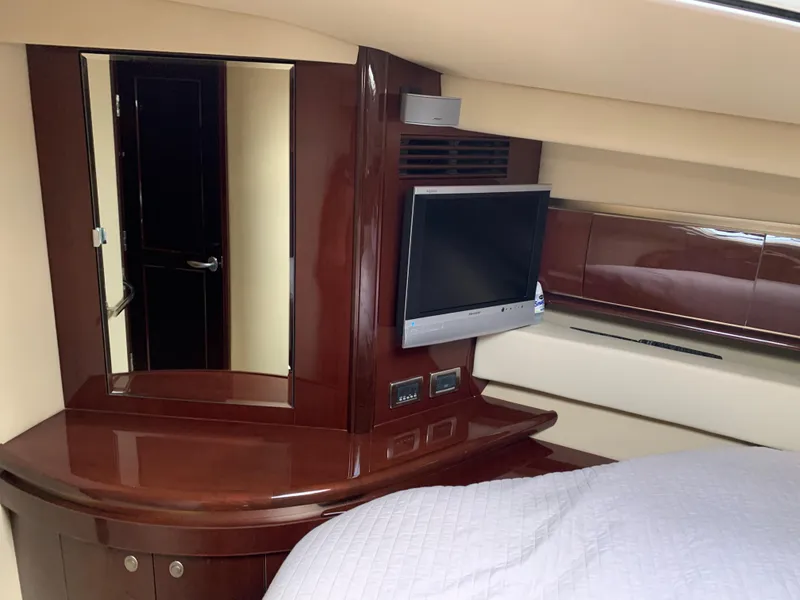 Slide: The Image of Luxurious interior of 2007 Sea Ray 52 Sundancer with TV and mirror. - 30