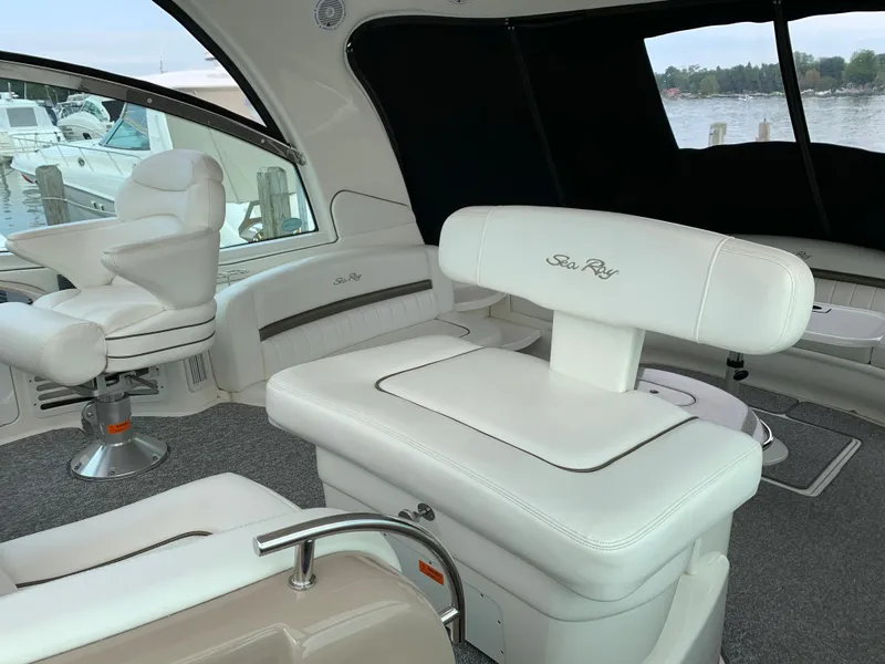 Slide: The Image of Interior of 2007 Sea Ray 52 Sundancer with white leather seating. - 38