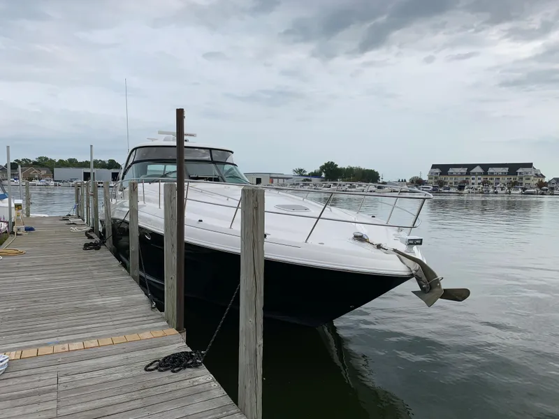 Slide: The Image of 2007 Sea Ray 52 Sundancer docked under cloudy skies. - 4