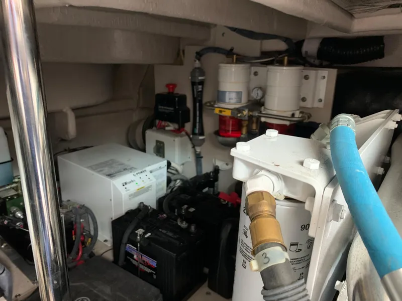 Slide: The Image of Engine room of 2007 Sea Ray 52 Sundancer with technical components. - 43