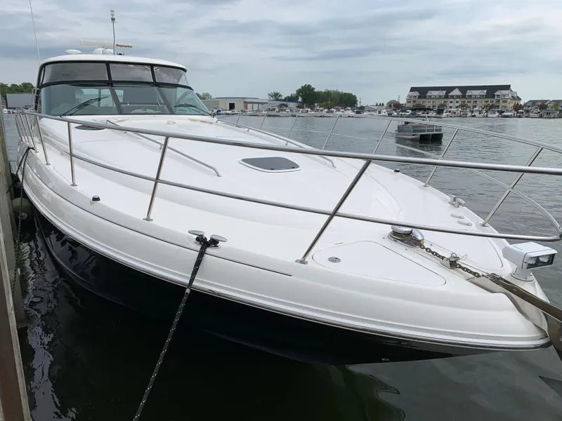 Slide: The Image of 2007 Sea Ray 52 Sundancer yacht docked at harbor. - 48