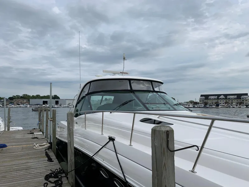 Slide: The Image of 2007 Sea Ray 52 Sundancer docked under cloudy skies. - 49