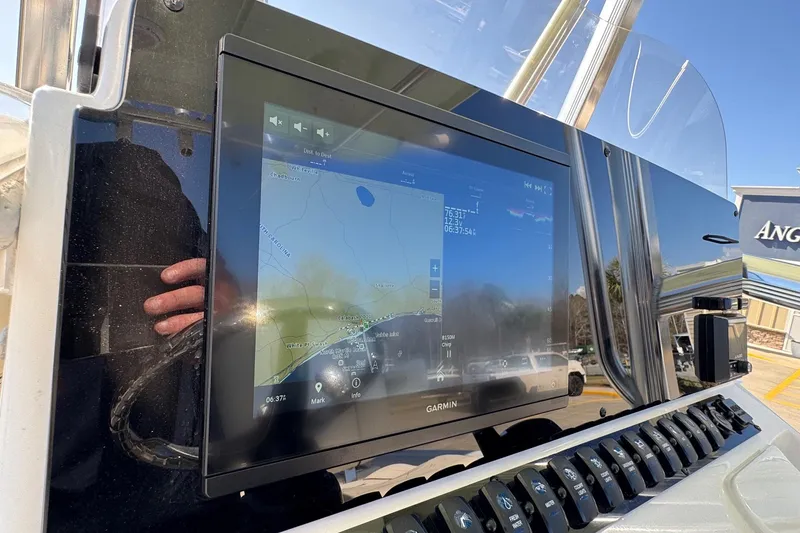 Slide: The Image of Close-up of Garmin navigation display on 2023 Sea Hunt Ultra 234 boat console. - 20