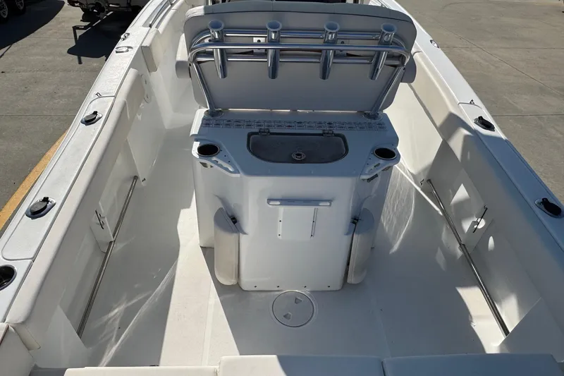 Slide: The Image of 2023 Sea Hunt Ultra 234 boat interior with seating and storage compartments. - 8