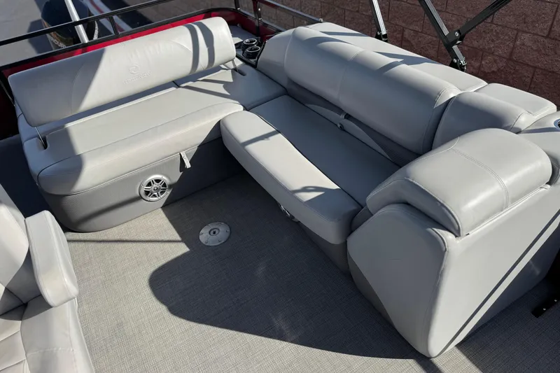 Slide: The Image of Luxurious seating on 2023 Regency 250 DL3 pontoon boat with gray upholstery. - 18