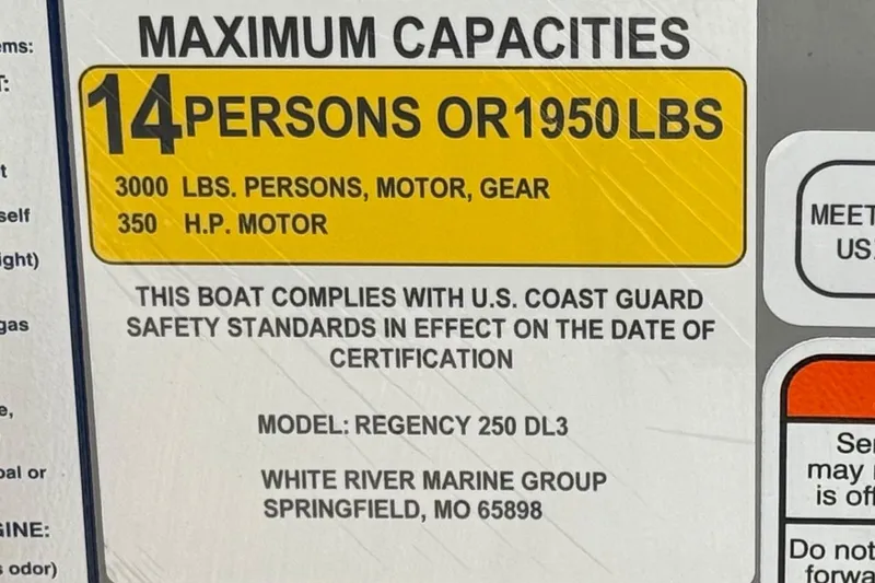 Slide: The Image of 2023 Regency 250 DL3 boat capacity label, 14 persons or 1950 lbs, 350 HP motor. - 35