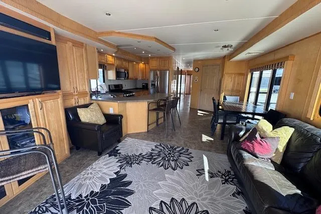 Slide: The Image of Luxurious 2006 Destination Yachts interior with modern kitchen, dining, and living area. - 12