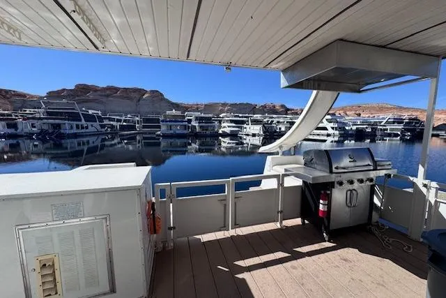 Slide: The Image of Outdoor deck of 2006 Destination Yachts with grill, overlooking marina and scenic views. - 13