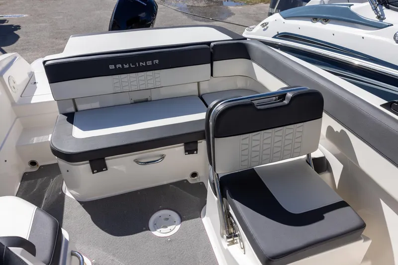 Slide: The Image of 2021 Bayliner VR6 Bowrider OB interior seating with modern design and comfortable upholstery. - 5