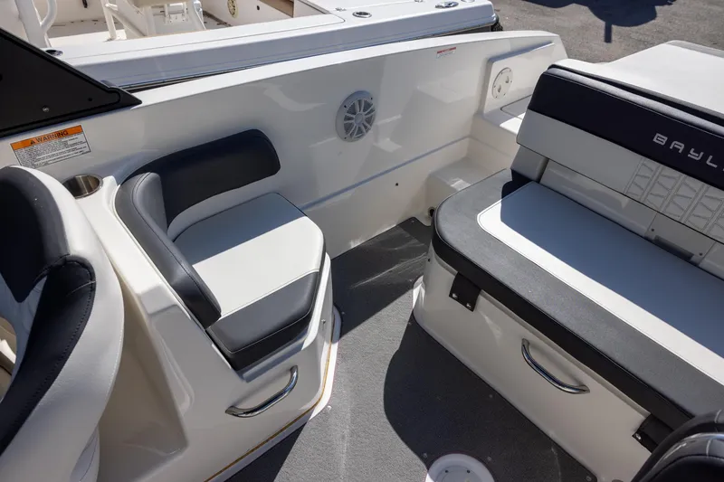 Slide: The Image of 2021 Bayliner VR6 Bowrider OB interior seating with modern design and comfortable upholstery. - 6