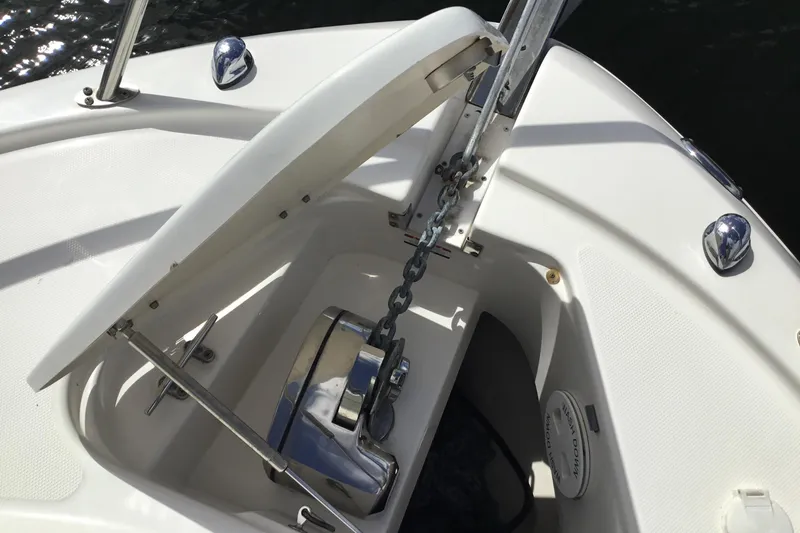 Slide: The Image of 2017 Robalo R305 Walkaround anchor locker with chain and winch system. - 10