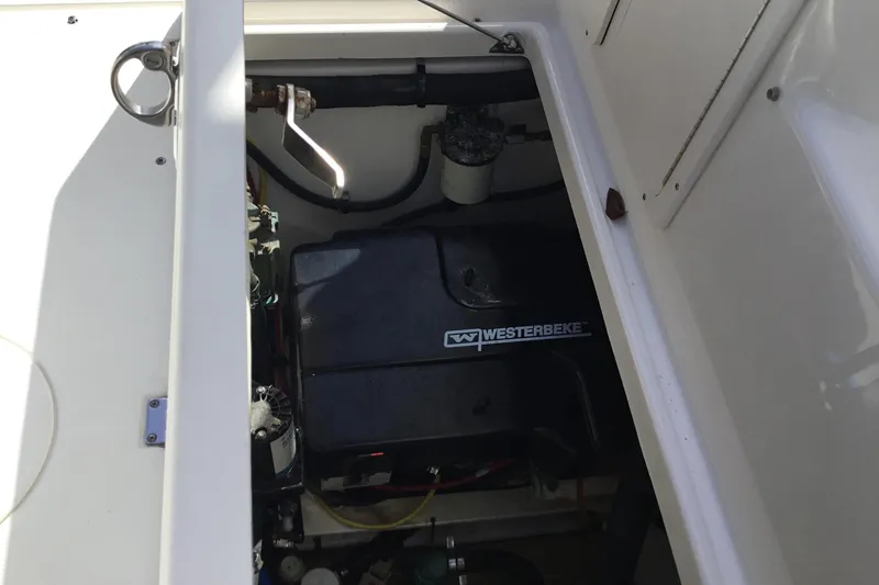Slide: The Image of Engine compartment of 2017 Robalo R305 Walkaround with Westerbeke generator. - 23