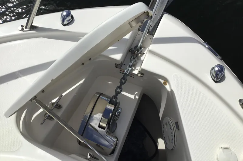 Slide: The Image of 2017 Robalo R305 Walkaround anchor locker with chain and winch system. - 9