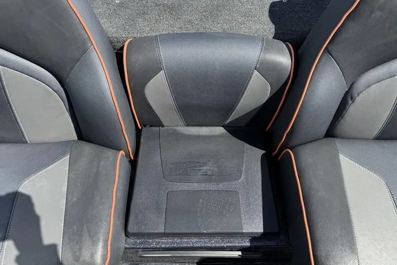 Slide: The Image of 2019 Skeeter ZX250 boat seats with black and orange trim. - 22