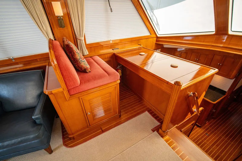 Slide: The Image of Interior of 2004 Grand Banks 58 Eastbay FB with wood finish and seating area. - 22