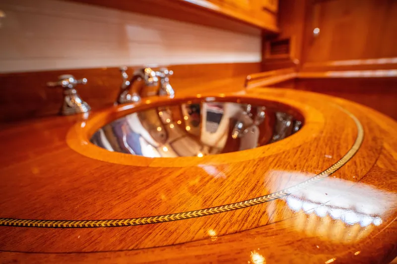 Slide: The Image of Luxurious wooden sink area on 2004 Grand Banks 58 Eastbay FB yacht. - 49