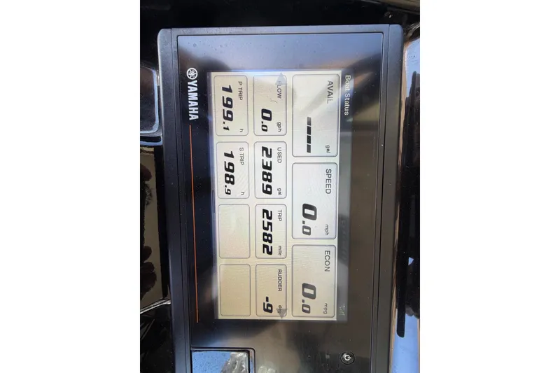 Slide: The Image of Yamaha display panel on 2021 Scout 330 LXF boat showing trip and fuel data. - 17