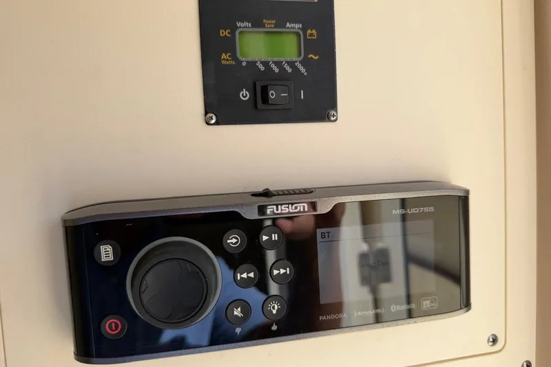 Slide: The Image of Control panel and Fusion MS-UD755 stereo on 2021 Scout 330 LXF boat. - 21